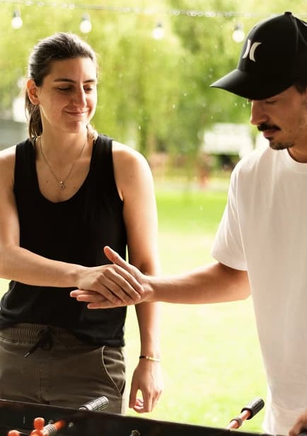 Team members collaborating outdoors